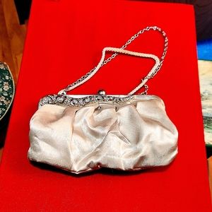 Jacqueline Ferrar clutch with diamond accents.